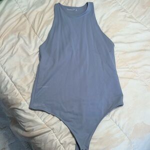Abercrombie and Fitch body suit with an asymmetrical back.